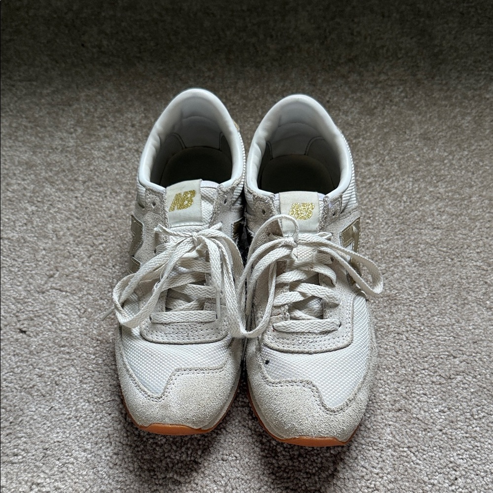 New Balance White and Gold Sneakers
